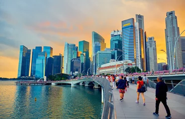Foto op Plexiglas Singapore skyscrapers during sunset © badahos