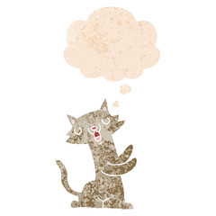 cartoon cat and thought bubble in retro textured style