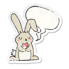 cartoon rabbit in love and speech bubble distressed sticker