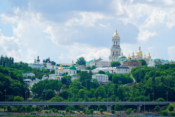 Fototapeta na wymiar Kyiv cityscape with with Kiev Pechersk Lavra monastery and the Motherland Monument, Ukraine. Kiev Pechersk Lavra or the Kiev Monastery of the Caves.