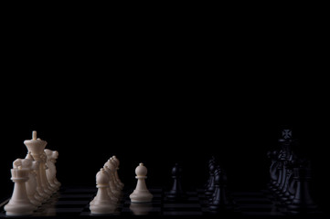 Business strategy concept on black background. Start up business planning Strategy idea with chess game. 2