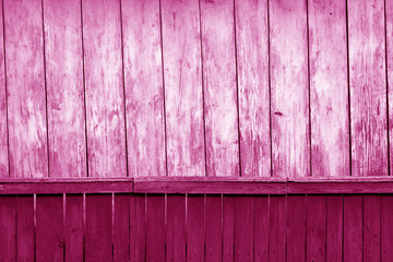 Old grunge wooden fence and wooden wall pattern in pink tone.