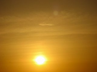  Sunset sky abstract background. Yellow sunset sky over the sea. Golden time of sky at sunset - sunrise time in summer season