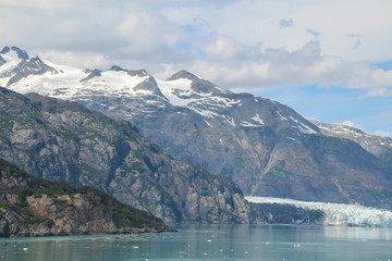 Fototapeta na wymiar Cloudy skies over mountains in Glacier Bay