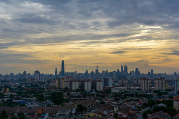 Sunset view over downtown Kuala Lumpur (KL). KL is the capital of Malaysia. Its modern skyline is dominated by KLCC, KL Tower and Exchange106. 