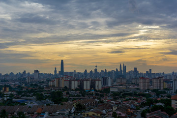 Fototapeta premium Sunset view over downtown Kuala Lumpur (KL). KL is the capital of Malaysia. Its modern skyline is dominated by KLCC, KL Tower and Exchange106. 
