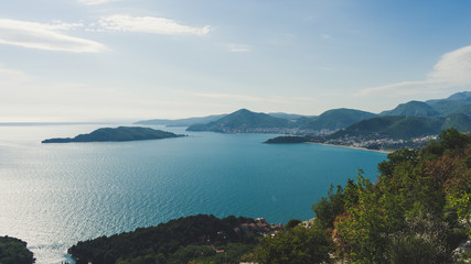 Obraz premium Panoramic landscape of the rocky coastline sea and Beach. Budva, Montenegro. Top view. View from the top of the mountain.