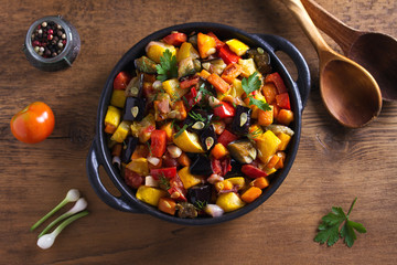 Vegetable stew: eggplant, pepper, tomato, zucchini, carrot and onion. Stewed vegetable salad