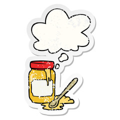cartoon jar of honey and thought bubble as a distressed worn sticker