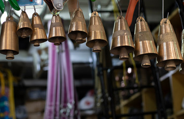 Row of hanging bells from small to large...