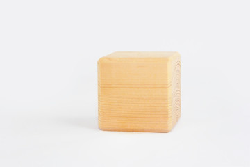 wooden decorative cube with patterns of divorces on white background