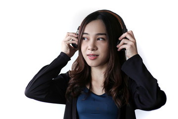 Fototapeta premium Pretty beautiful asian woman wearing headphone and listening music on white background.