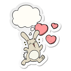 cartoon rabbit in love and thought bubble as a printed sticker
