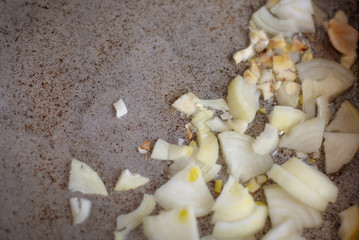 chopped fried onions in a pan.