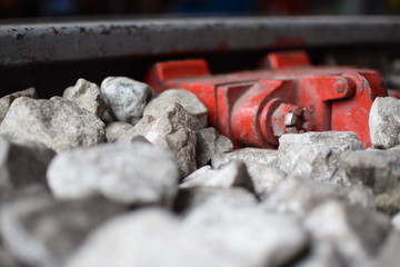 The rock on railroad tracks