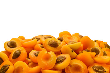 Ripe juicy orange apricots slices isolated on white background. Space for text or design.