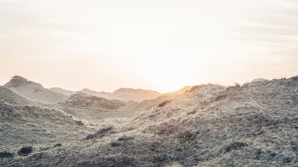 Tranquil and colorful sunset at the beach in Grønhoj Strand near Løkken, Denmark