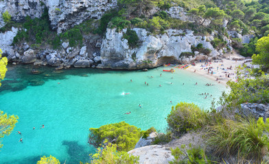 Beautiful beach with turquoise water in bay Cala Macarelleta on Menorca, Spain.
