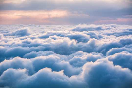 View of the clouds from above at dawn © Nikolay Denisov