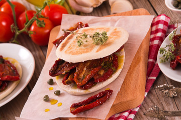 Tigella bread with sun-dried tomatoes.