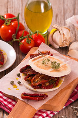 Tigella bread with sun-dried tomatoes.
