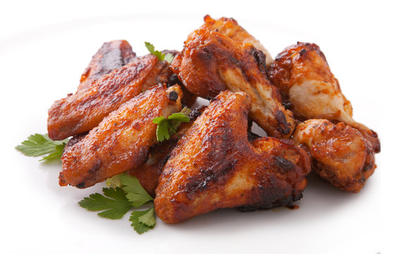 Plate of delicious barbecue chicken wings