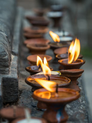 Small Candles on Stone Ledge, Prayer Candles, Terra Cotta