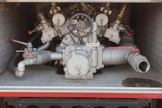 Close up on mechanics of a fire truck. Industrial, valves, mechanics.