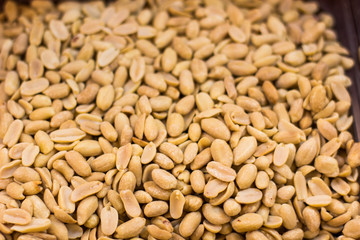 cleaned peanuts food background in supermarket counter for selling