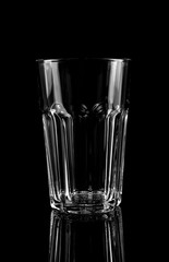 New clean empty glass on black background