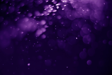 Bokeh purple proton background abstract