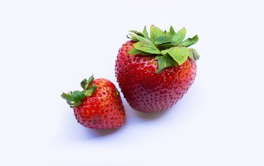 Two strawberries on white background