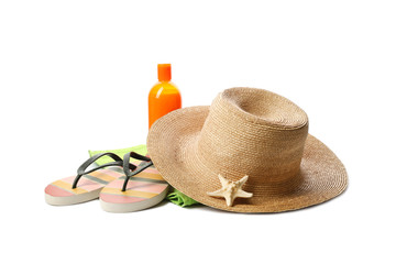 Different stylish beach accessories on white background