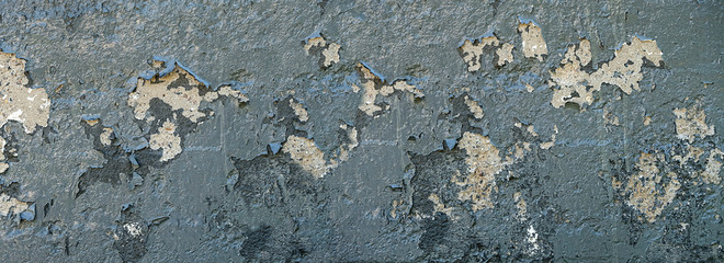old gray painted wall with dirty paint. Peeling paint of gray cement wall. Cracked flaking grey paint on wall. Old wall texture background for web design and wallpapers. banner