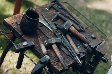 Blacksmith at work and tool