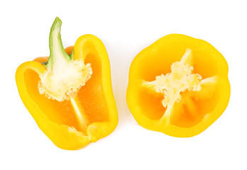 Cut yellow bell peppers isolated on white, top view