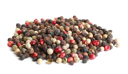 Heap of mixed peppercorns isolated on white