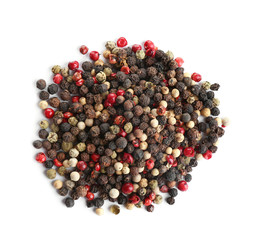 Heap of mixed peppercorns isolated on white, top view