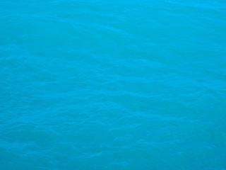 Obraz premium turquoise waves, water surface texture