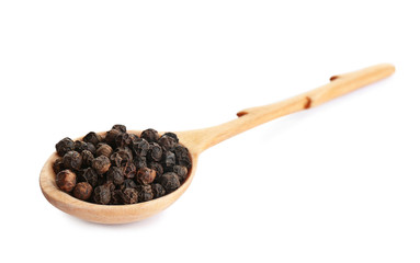 Spoon of black peppercorns isolated on white