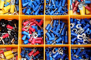Colorful connectors separated by orange tool box