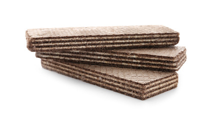 Delicious chocolate wafer sticks isolated on white