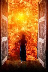 Woman walking into the fire