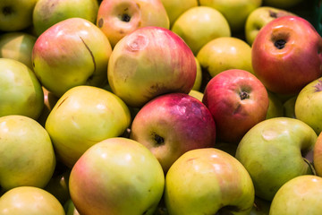 delicious juicy apples on the supermarket counter