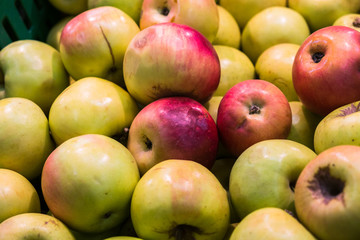 delicious juicy apples on the supermarket counter