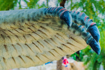 Close up to Colorful and patterns of  dinosaur model surfaces created with cement