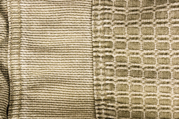 clothing items stonewashed cotton fabric texture with seams, clasps, buttons and rivets, macro