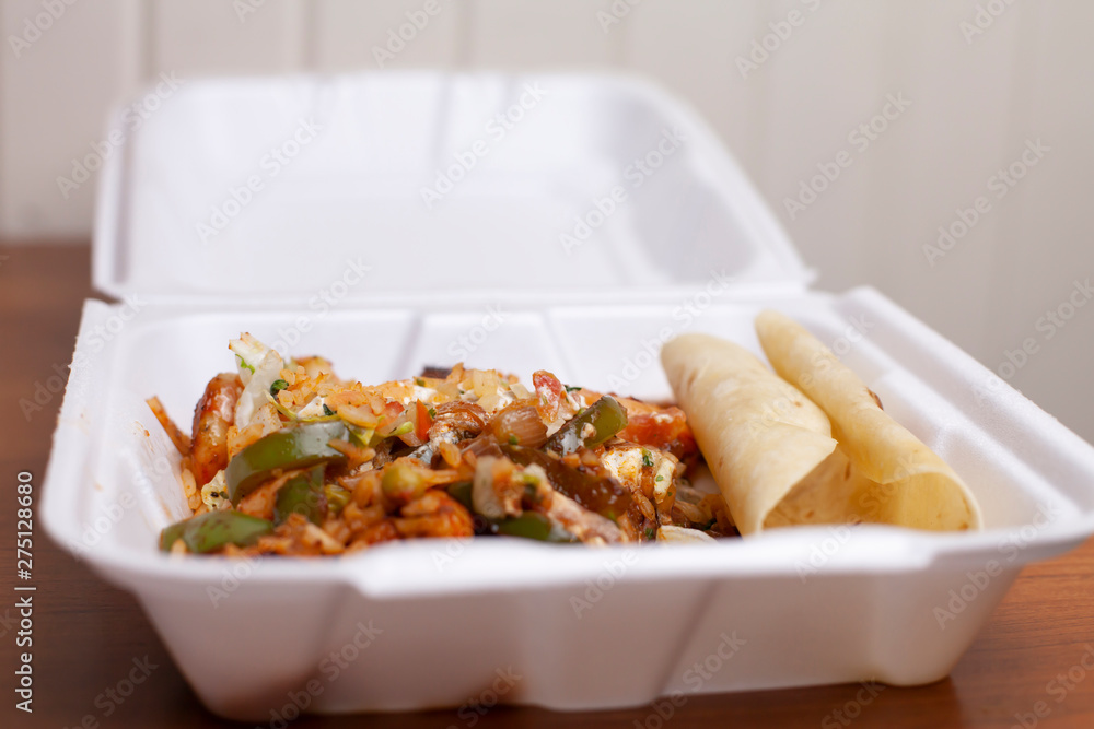 Wall mural fajita fixings in a carryout box