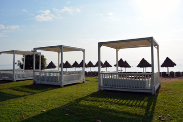 Beds and sun loungers in a beach club