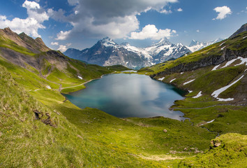 Naklejka na ściany i meble Swiss beauty, Schreckhorn and Wetterhorn from Bachalpsee lake, Bernese Oberland, Switzerland, Europe